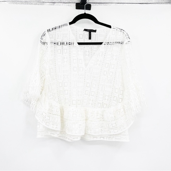 BCBGMaxAzria Immane Peplum White
Lace Top - Picture 2 of 7